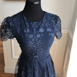 Special occasion navy lace overlay dress